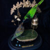 Taxidermy Emerald Starling feeding juvenile Lamprotornis iris